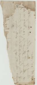 Torn fragment of paper with faint handwriting, kept in the file.